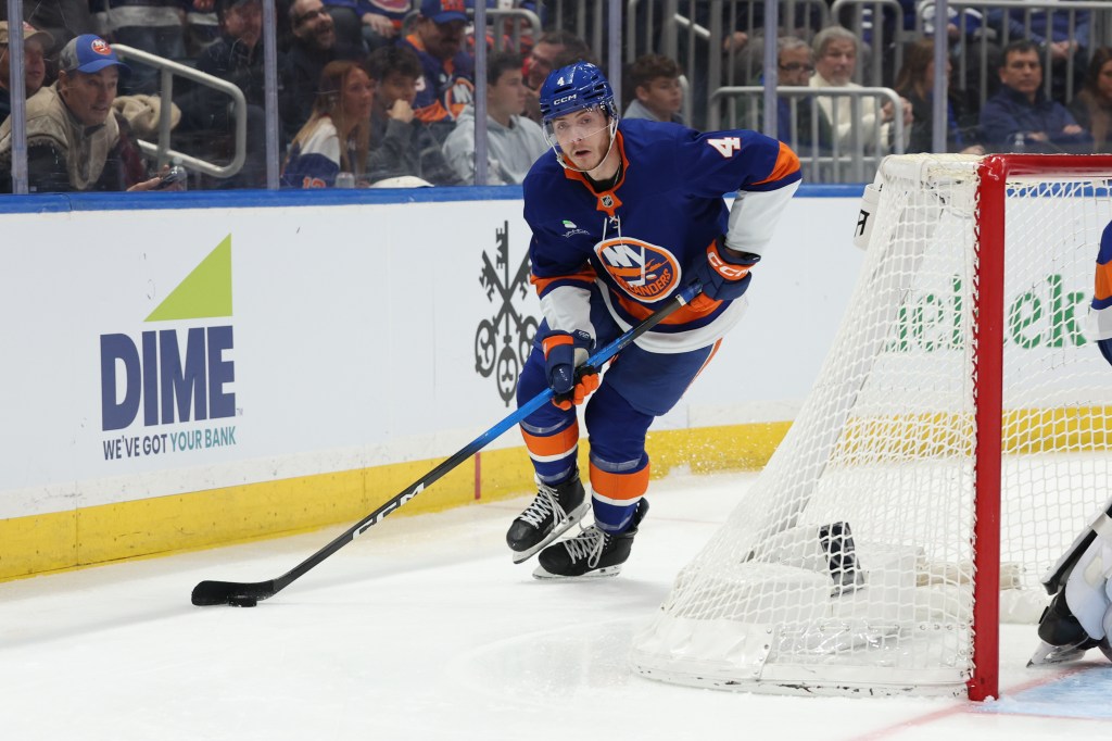Islanders defenseman Cole McWard (4) skates with the puck against the Toronto Maple Leafs during the third period at UBS Arena. 