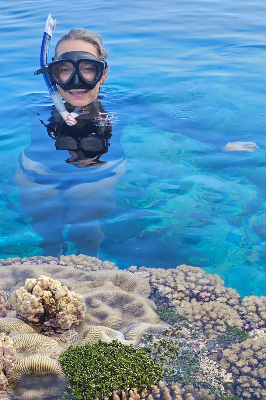 Travel writer Terry Ward snorkels in a rock pool along the coast of Niue.
