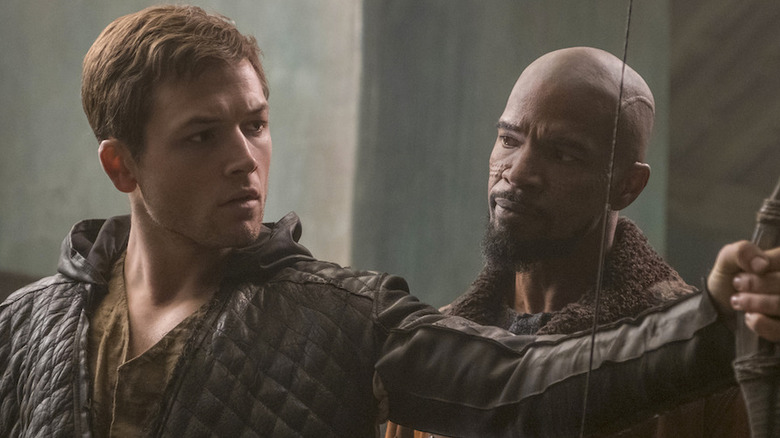 John looking at Robin in Robin Hood (2018)