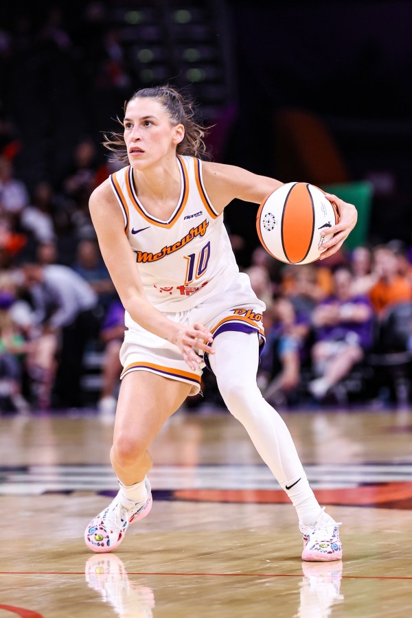 PHOENIX, ARIZONA - MAY 11: Sevgi Uzun #10 of the Phoenix Mercury dribbles the ball during the second quarter against the Golden State Valkyries at PHX Arena on May 11, 2025 in Phoenix, Arizona.