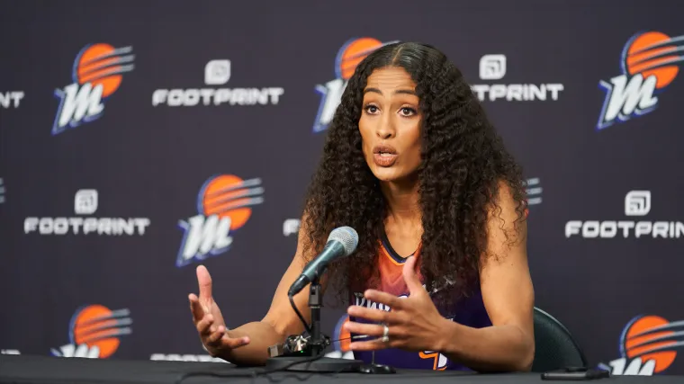 WNBA's Skylar Diggins: sky-high slit marks sizzling turn in skin-baring gown image