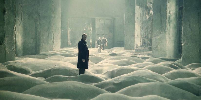 A man standing in a smoky room in Stalker