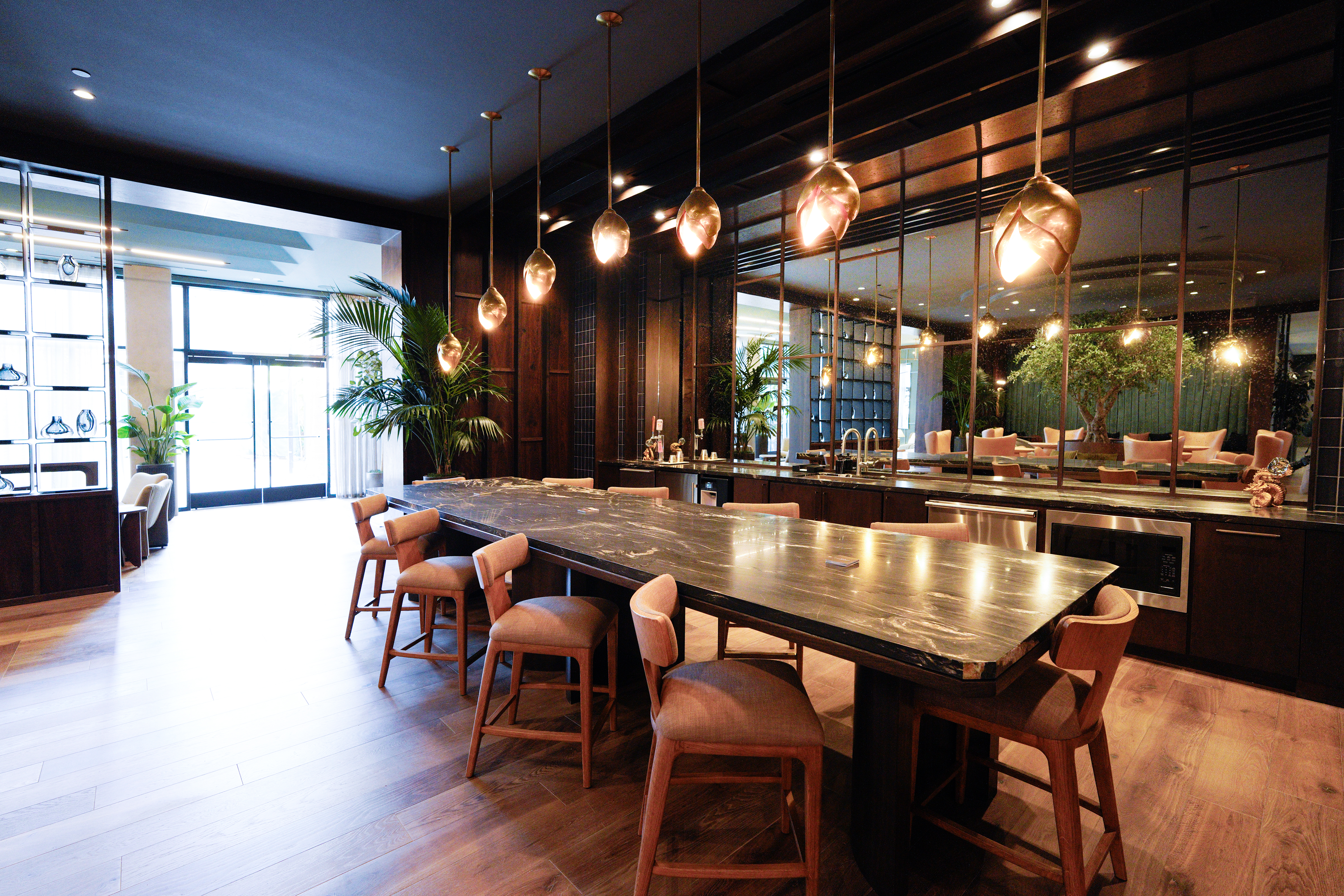 A ground floor lounge area at the Alexan Camellia (Nelvin...