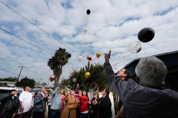 On Thursday, Jan. 22, 2026, in the Southcrest neighborhood, residents released ballots marking their 2nd anniversary of the 2024 flood. (Nelvin C. Cepeda / The San Diego Union-Tribune)