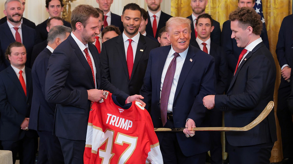 Florida Panthers players interact with President Donald Trump