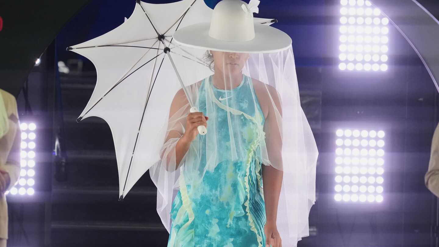 Naomi Osaka makes grand entrance with fashion statement at Australian Open