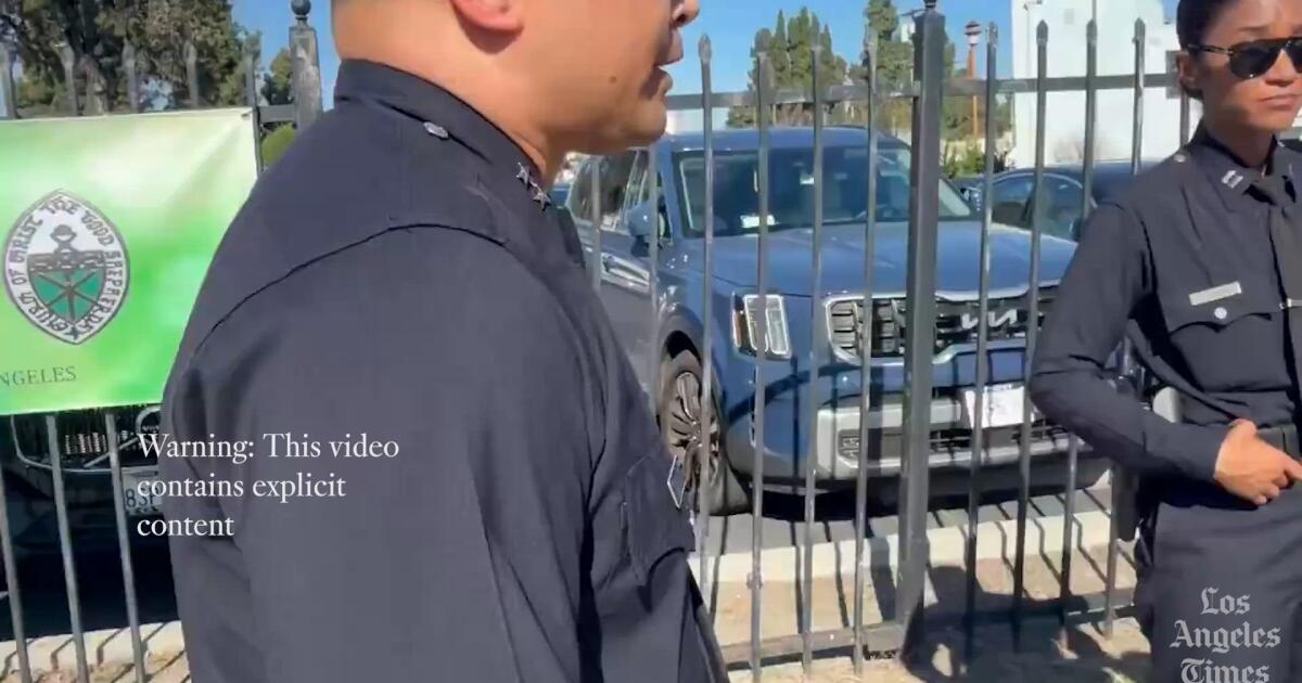 Tense exchange between LAPD deputy chief and police critic goes viral