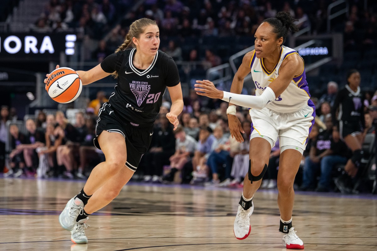 SAN FRANCISCO, CALIFORNIA - MAY 6: Kate Martin #20 of the Golden State Valkyries dribbles against Azura Stevens #23 of the Los Angeles Sparks during a game at Chase Center on May 6, 2025 in San Francisco, California. (Photo by Supriya Limaye/ISI Photos/Getty Images)