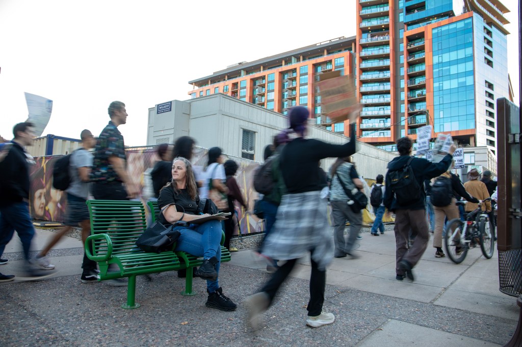 students march at a protest