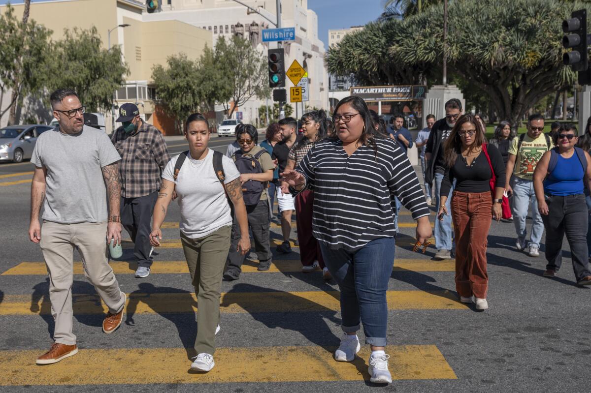 Eunisses Hernandez speaks to other community organizers from around the United States in MacArthur Park.