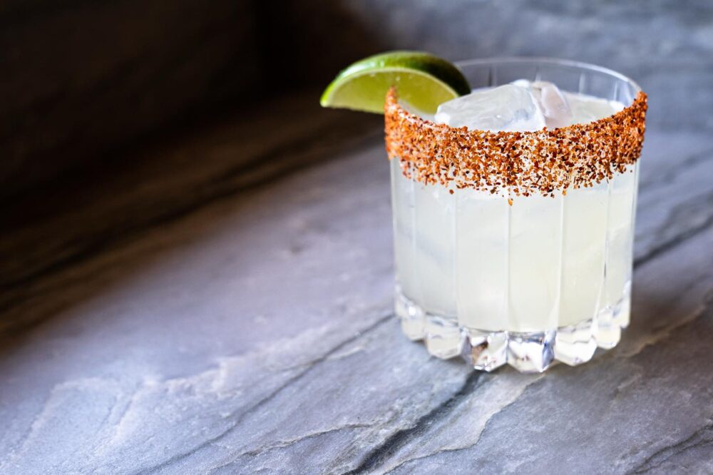 A cocktail from Bludorn with spice around the rim of the glass