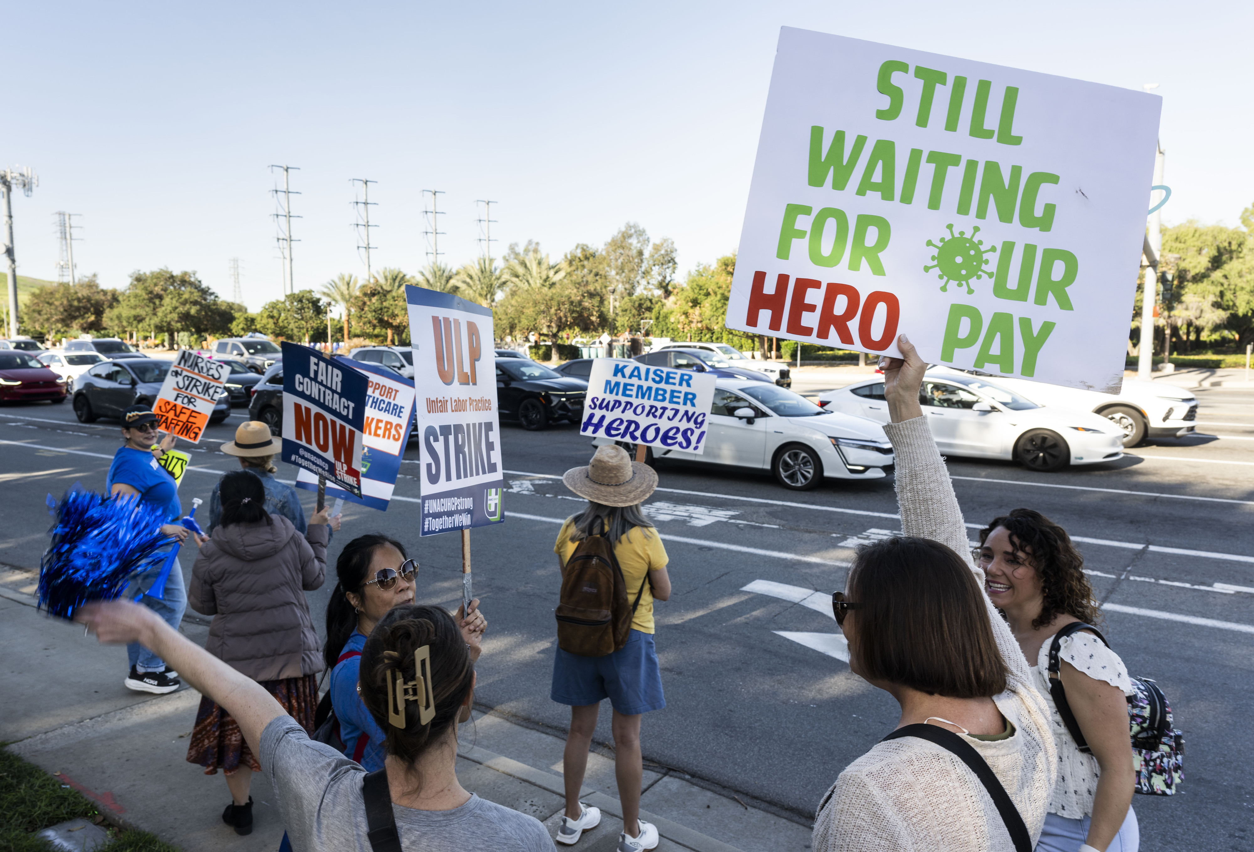 Workers protest at Kaiser Permanente on Alton Pkwy. in Irvine,...