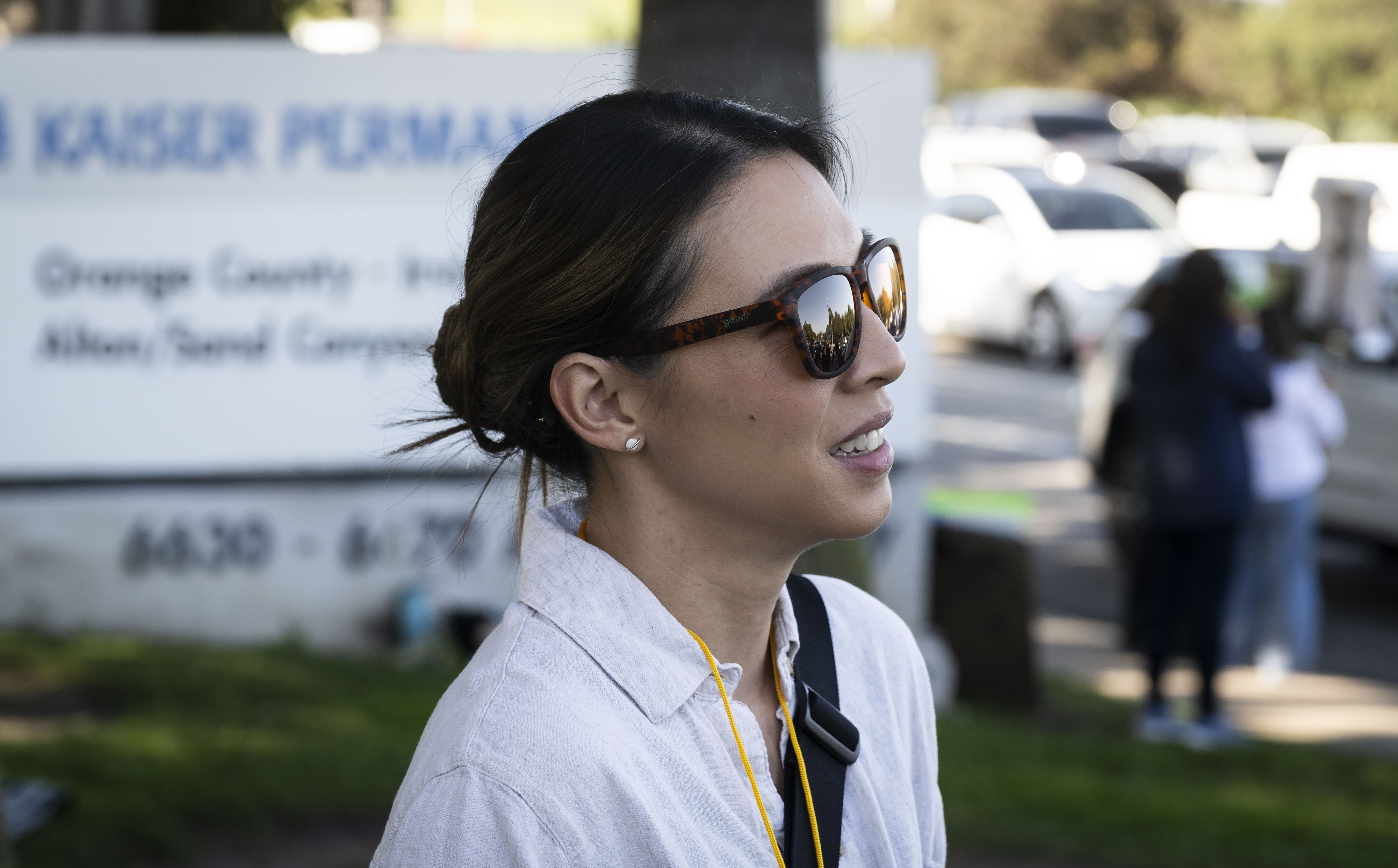 Chrissy Nguyen, RN, protests with others at Kaiser Permanente on...