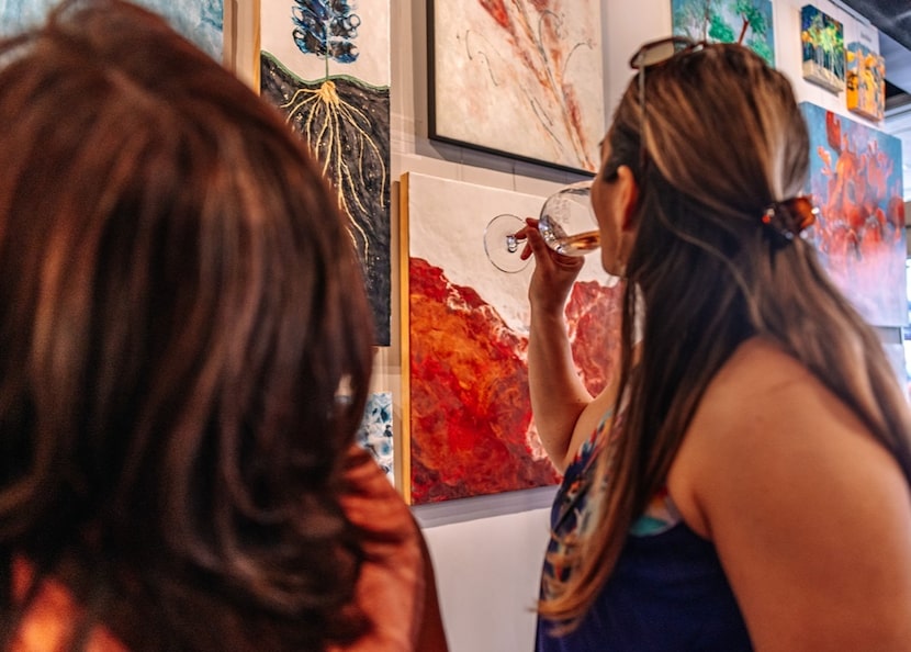 While decorating cookies, enjoy two glasses of wine and admire original artworks from Texas...