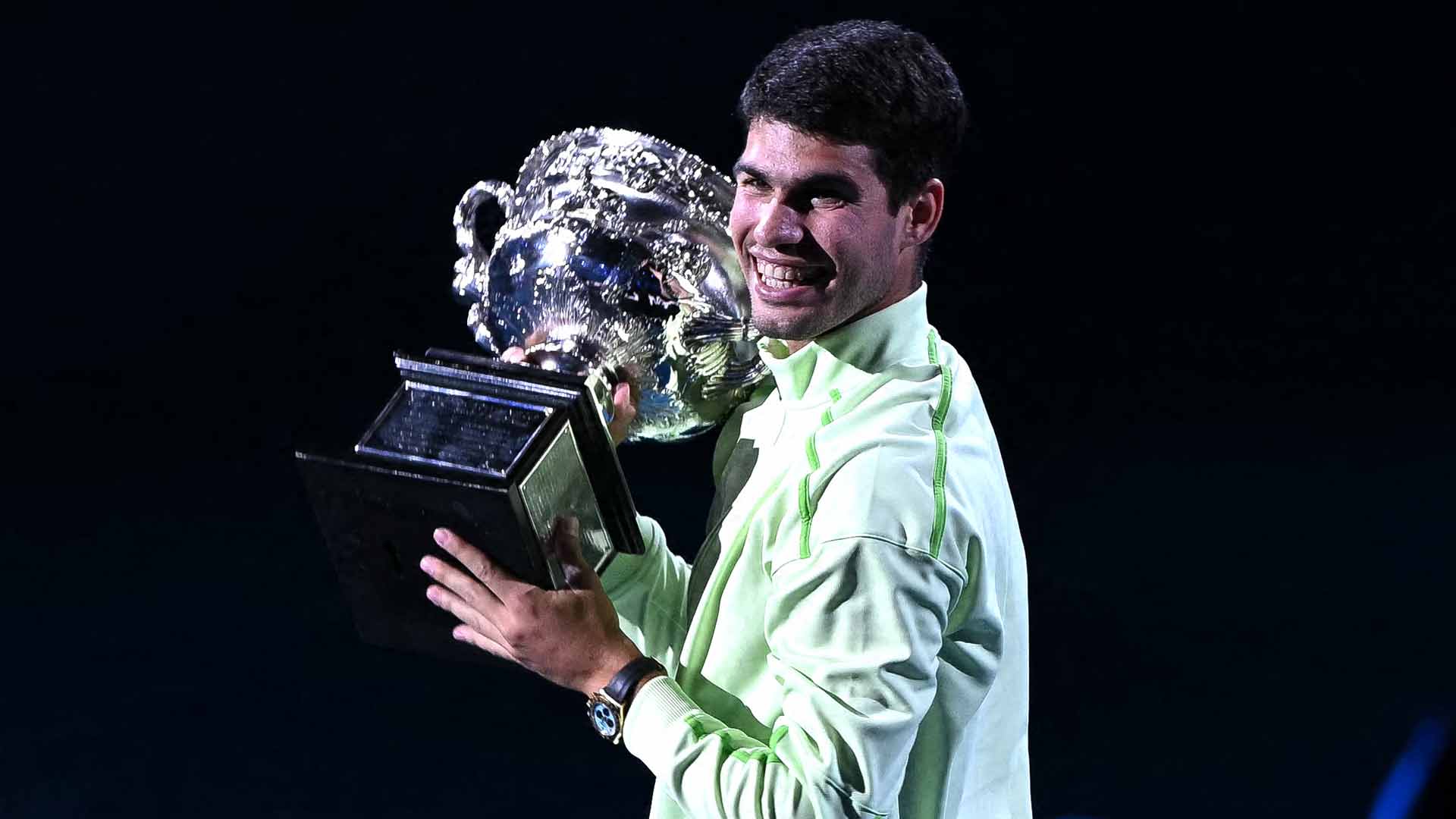Carlos Alcaraz celebrates his first Australian Open victory.