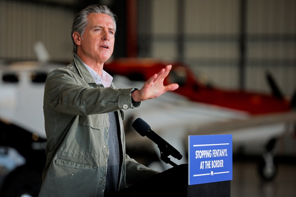 California Governor Gavin Newsom gestures during a press conference on law enforcement efforts targeting illicit fentanyl.