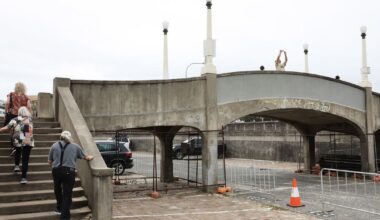 Man arrested after allegedly mimicking shooting near footbridge