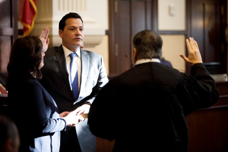 Precinct 2 County Commissioner Justin Rodriguez is sworn in on Tuesday.