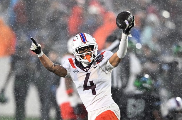 Greg Fiume -- Getty Images Virginia Tech's Mansoor Delane celebrates after recovering a fumble in the fourth quarter against Tulane during the Military Bowl on Wednesday at Navy-Marine Corps Memorial Stadium in Annapolis, Md.