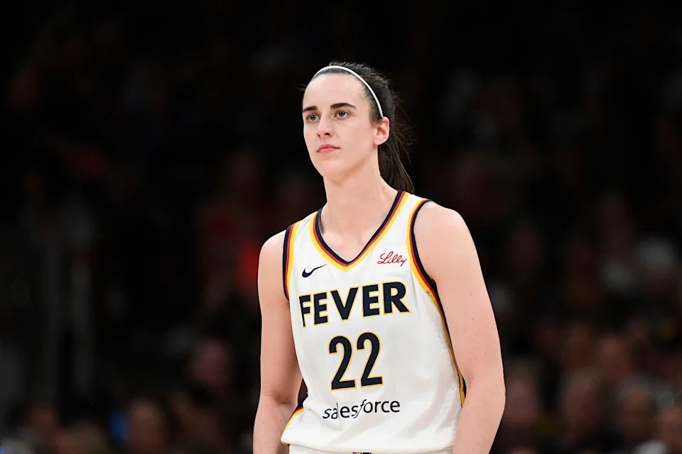 Indiana Fever guard Caitlin Clark (22) looks on during a WNBA game.Erica Denhoff/Icon Sportswire via Getty Images