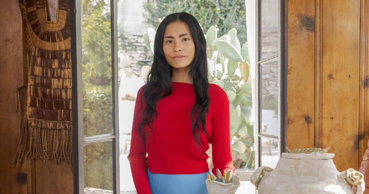 Artist Kyna Payawal designs a window display for Toast's L.A. store