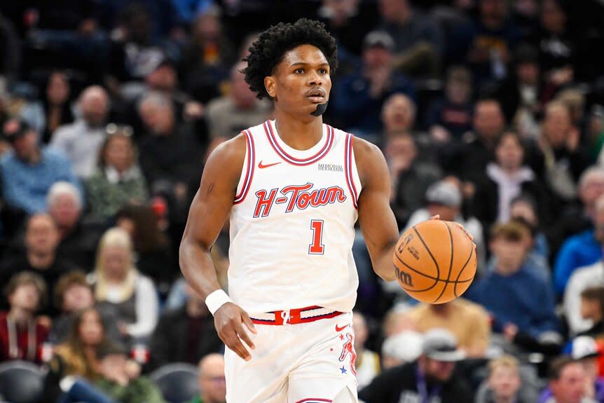 Amen Thompson of the Houston Rockets drives the ball during the first half of a game against the Utah Jazz.