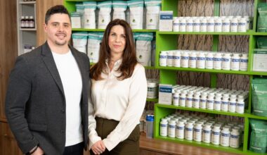 NutriChem CEO Dr. Emma Pollon-MacLeod, ND, and Director of Science Dr. Adam Livingston, PharmD, stand among the brand&rsquo;s signature supplement line, reflecting NutriChem