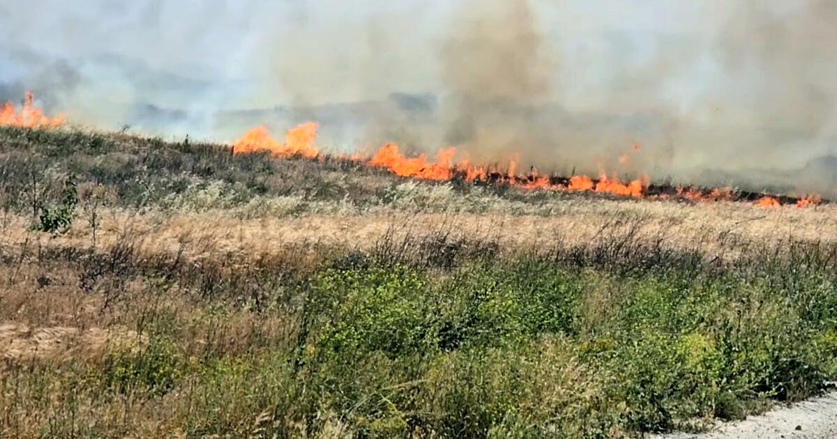 Two fires break out in Southern California amid Santa Ana winds, triggering evacuations