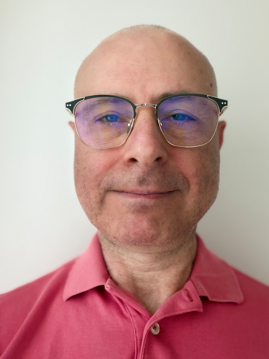 Selfie of man in glasses close to camera.