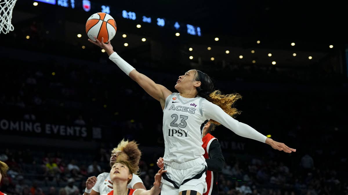 Las Vegas Aces guard Chennedy Carter soars for a layup during an exhibition game against Team Japan at Michelob Ultra Arena on April 26, 2026.Candice Ward-Imagn Images