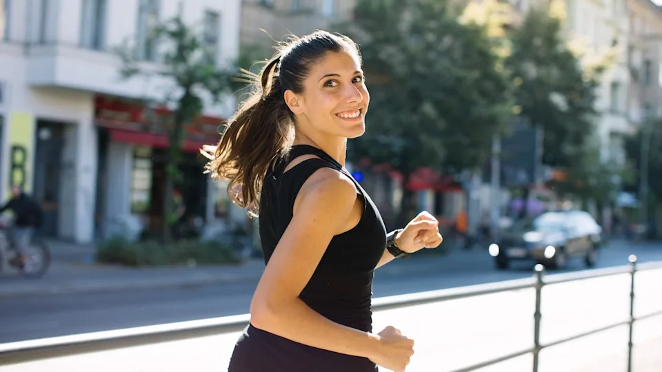 Woman jogging in city