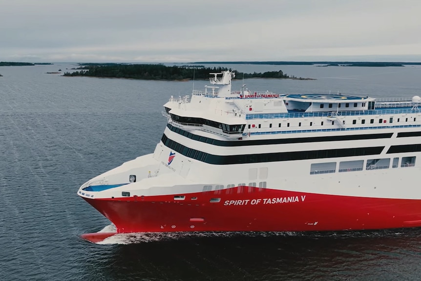 A large red and white ferry.