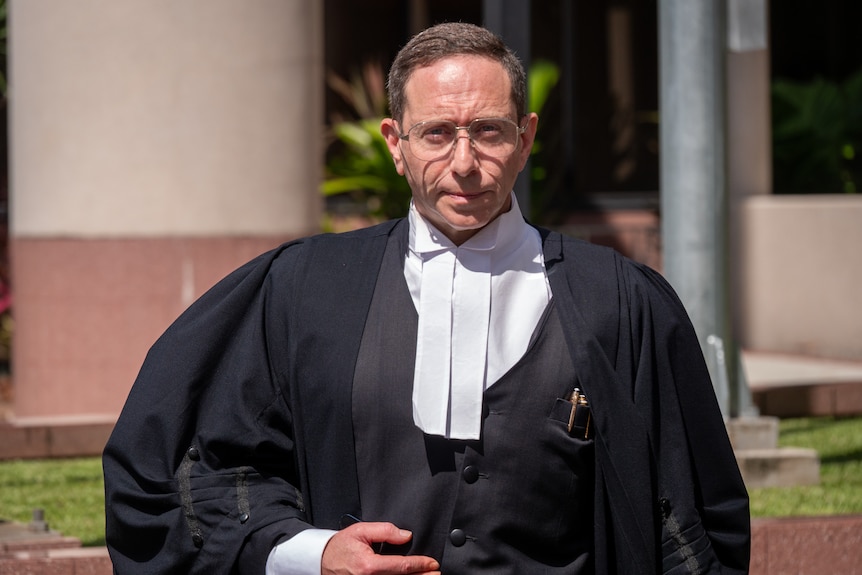 people leaving court on a sunny day