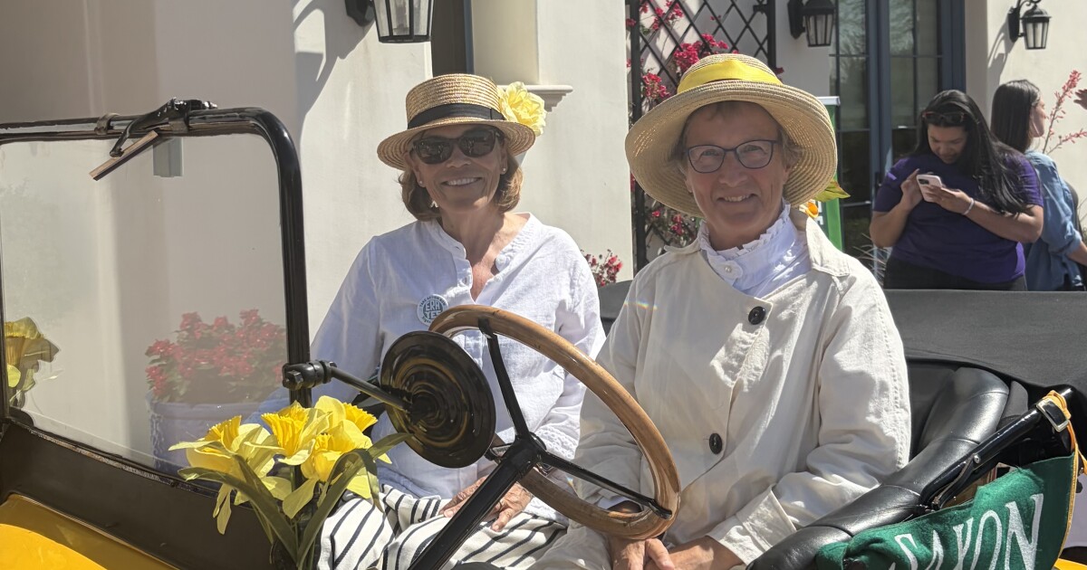 These Equal Rights advocates make a stop in Phoenix during 11,000 mile trip in replica roadster