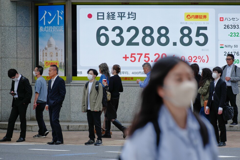 Oil jumps 3% and Asian shares are mixed after Wall Street set records