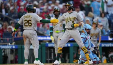 Ginn goes 8 innings and Gelof hits one of four A's homers in 12-1 rout of Phillies