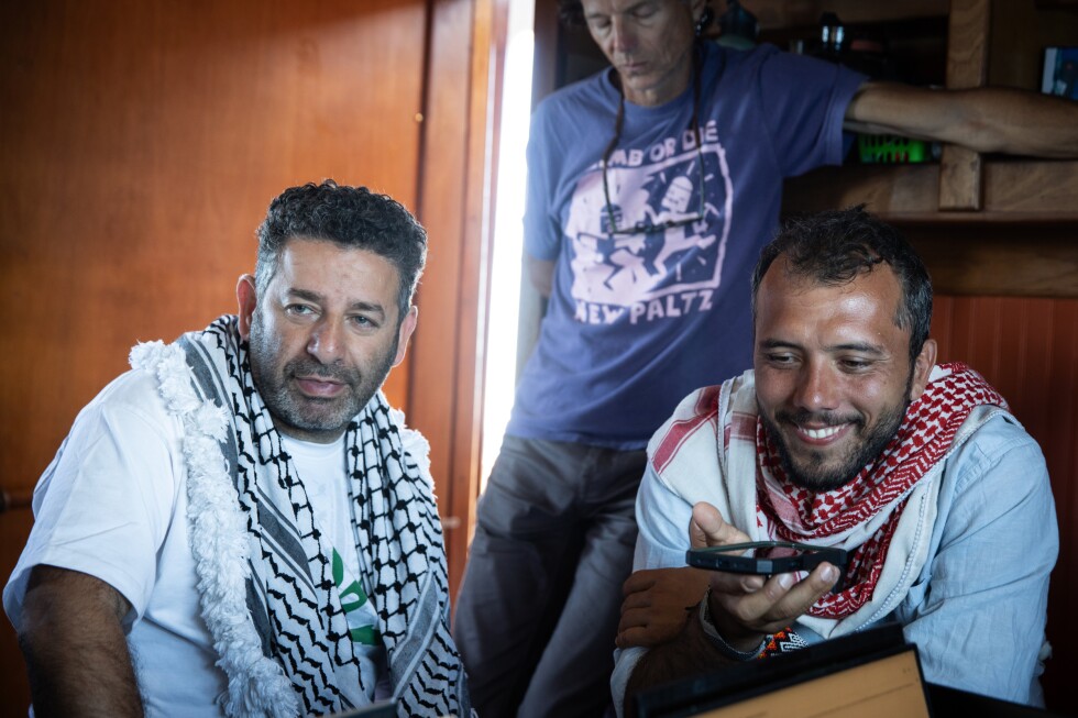 Israel says it's taking 2 flotilla activists back to Israel