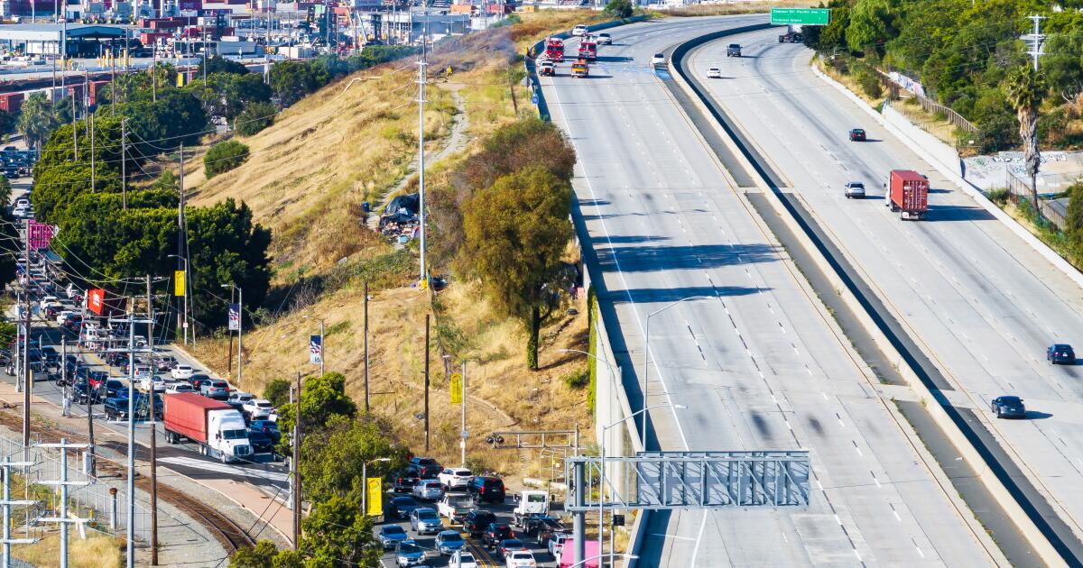 110 freeway begins to reopen after fire shuts down traffic near Port of L.A.