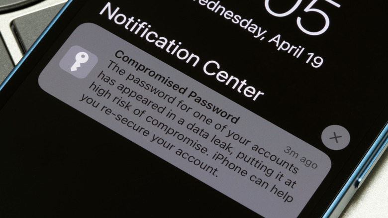 compromised password notification on an iPhone's lock screen
