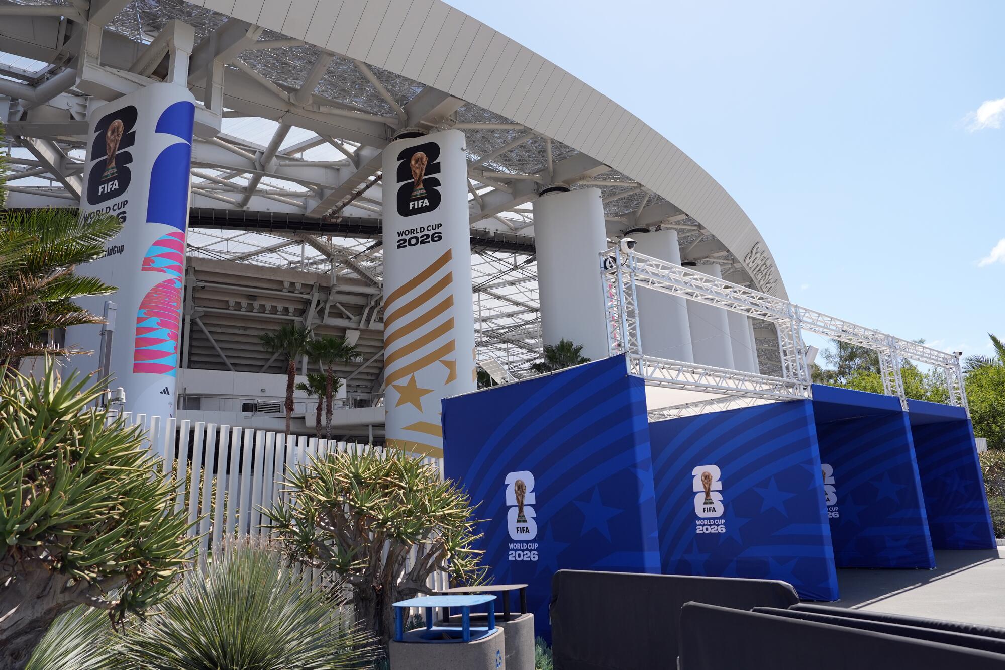 The exterior of SoFi Stadium is covered with signs promoting the 2026 World Cup.
