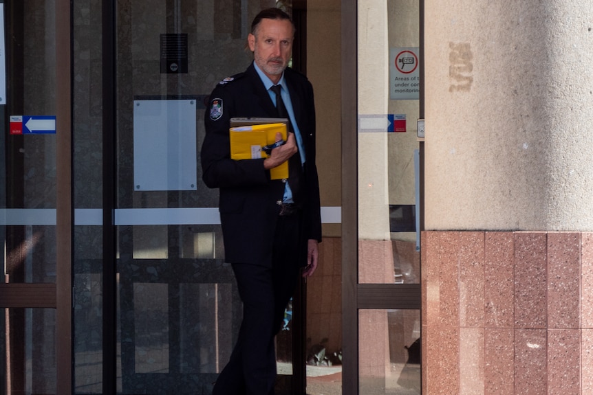 Man outside a courthouse