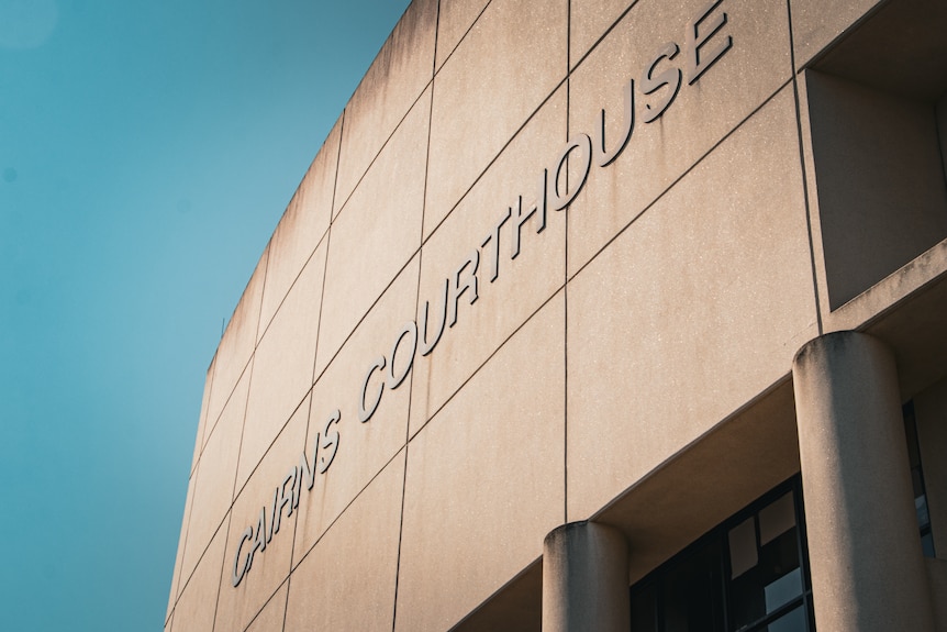 'Cairns Courthouse' written on the side of a building.