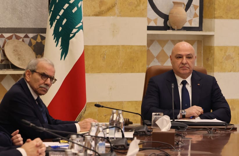 President Joseph Aoun (R) chairs the first meeting of Lebanon's new government, along with Premier Nawaf Salam, at the Baabda presidential palace, east of Beirut, on February 11, 2025
