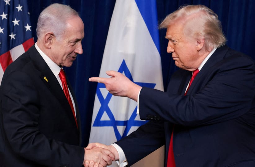 U.S. President Donald Trump points his finger towards Israeli Prime Minister Benjamin Netanyahu as they shake hands during a press conference after meeting at Trump’s Mar-a-Lago club in Palm Beach, Florida, US, December 29, 2025.