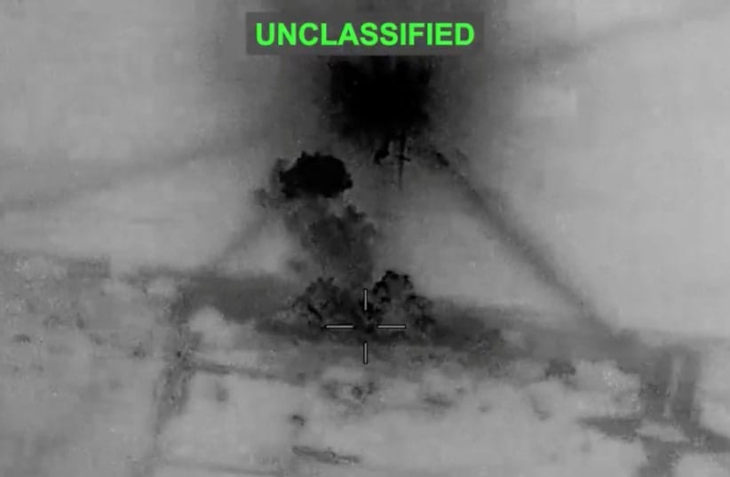 Smoke rises from explosions at an unknown location, following what U.S. Central Command (CENTCOM) said were strikes on Iran in response to an Iranian drone strike on a cargo ship in the Strait of Hormuz, in this screen grab from video released June 26, 2026. 