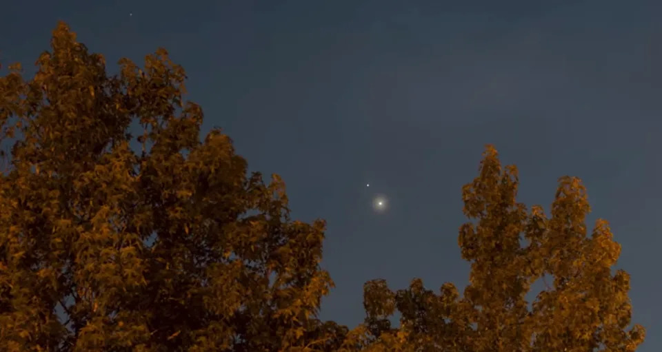 Venus and Jupiter are photographed together in the night sky during a previous conjunction involving the two planets.