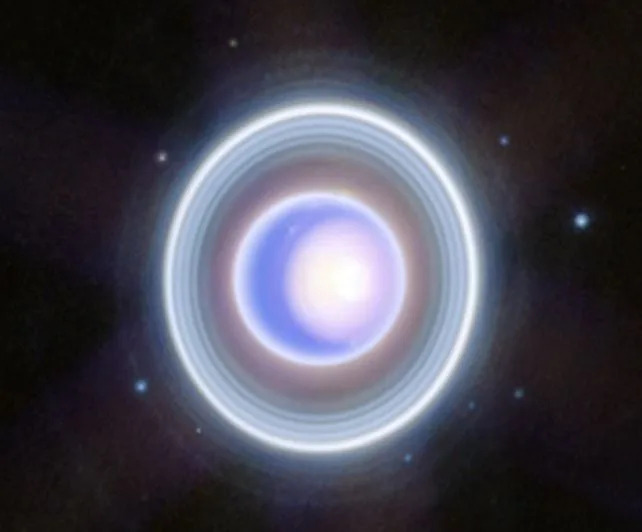 JWST image of Uranus, its rings, and moons Rosalind, Puck, Belinda, Desdemona, Cressida, Bianca, Portia, Juliet, and Perdita. (<a href="https://esawebb.org/images/weic2332a/" rel="nofollow noopener" target="_blank" data-ylk="slk:NASA, ESA, CSA, STScI;elm:context_link;itc:0;sec:content-canvas" data-yga="{"yLinkElement":"context_link","yModuleName":"content-canvas","yLinkText":"NASA, ESA, CSA, STScI"}" class="link ">NASA, ESA, CSA, STScI</a>)