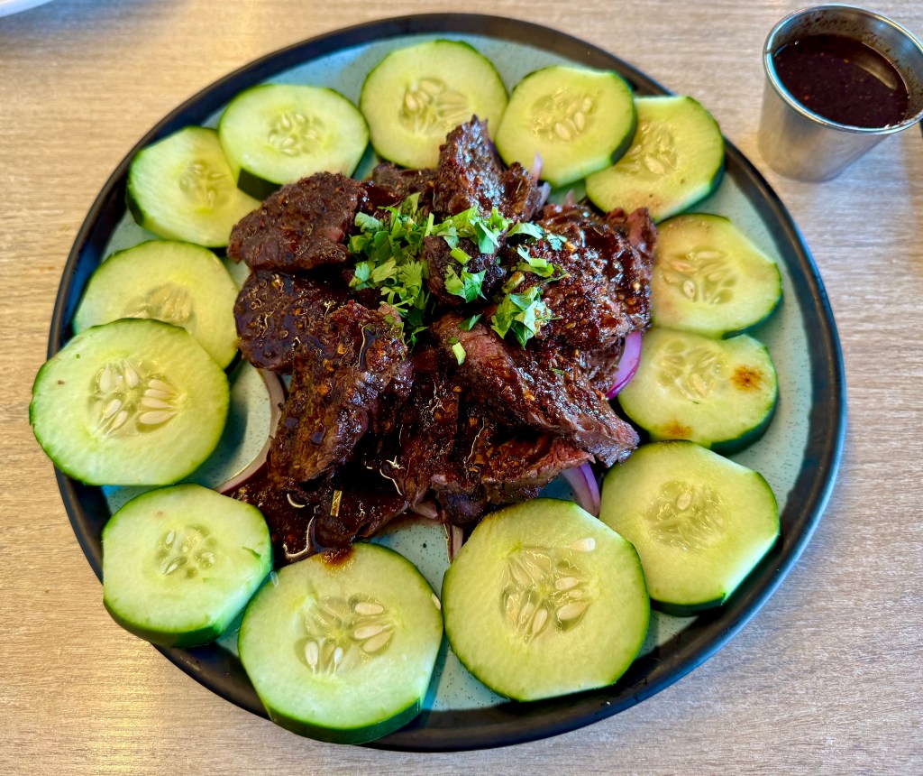 A platter of Aguachile Tasajo Steak from PoNy's Miches Michelada Bar & Grill.