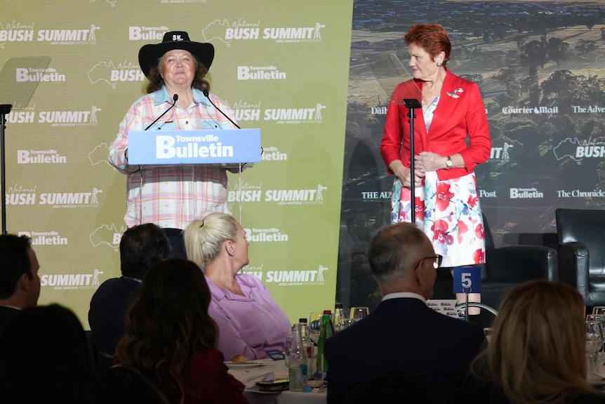 Gina Rinehart and Pauline Hanson on stage.