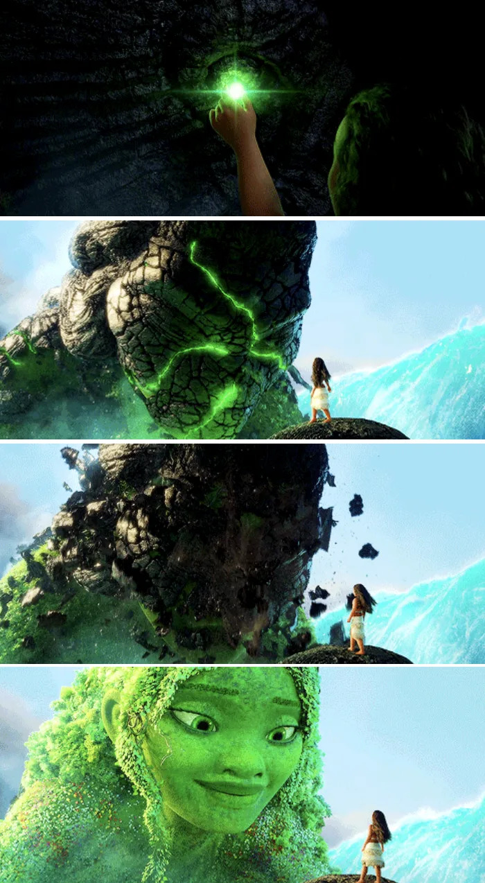 Moana gently putting the heart of Te Fiti on Te Ka, and the darkness of Te Ka falls off and Te Fiti is happily born again